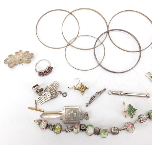 316 - Silver and white metal jewellery including key pendant, bracelets and propelling toothpick