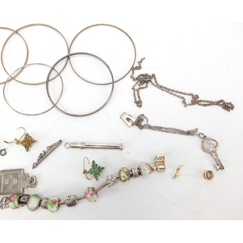 316 - Silver and white metal jewellery including key pendant, bracelets and propelling toothpick