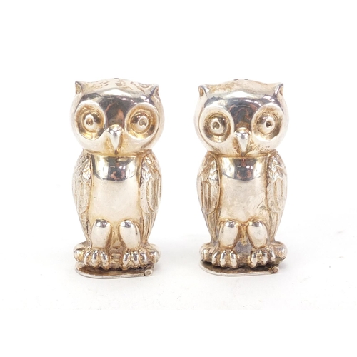 376 - Pair of novelty silver coloured metal owl salt and pepper casters, 5.5cm high