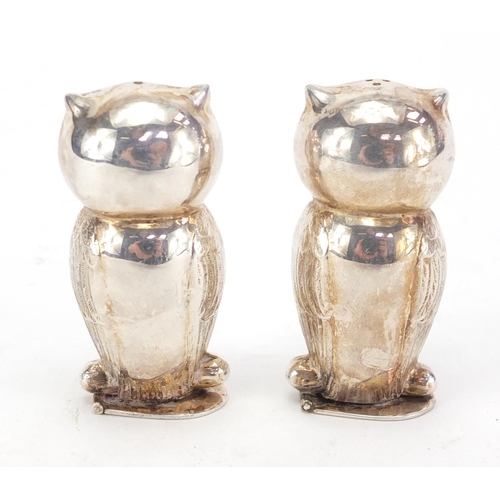 376 - Pair of novelty silver coloured metal owl salt and pepper casters, 5.5cm high