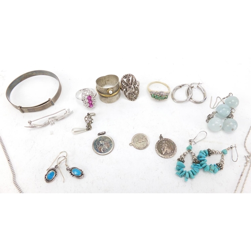 324 - Silver and white metal jewellery including necklaces, rings and bracelets