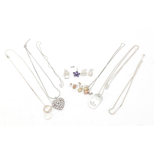 313 - Silver and white metal jewellery including necklaces, charms and pendants, approximate weight 90.0g