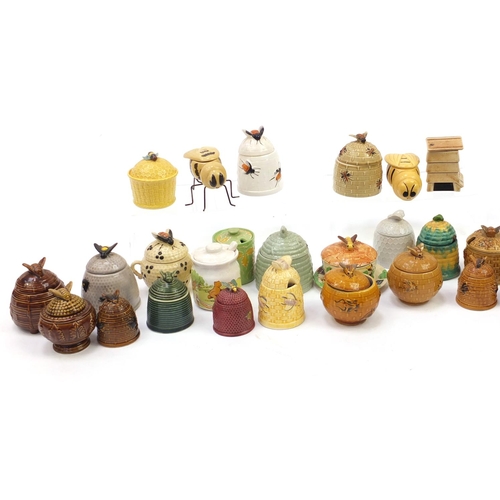 221 - Collection of novelty honey pots