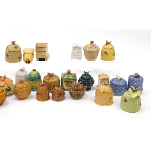 221 - Collection of novelty honey pots