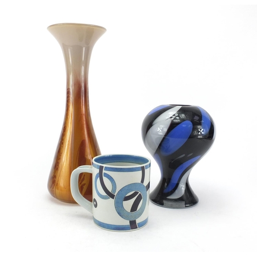 776 - China and glassware, Royal Copenhagen Fajance tankard and two art glass vases, the largest 35cm high