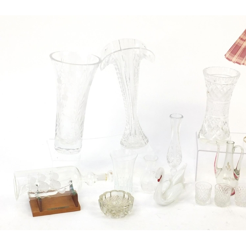 660 - Glassware including cut glass vases, table lamp and a ship in a bottle