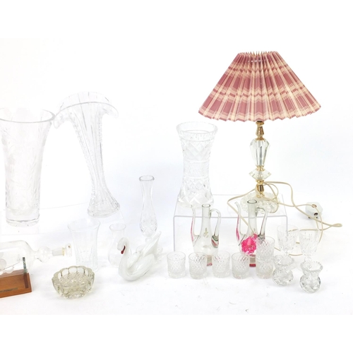 660 - Glassware including cut glass vases, table lamp and a ship in a bottle