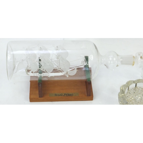 660 - Glassware including cut glass vases, table lamp and a ship in a bottle