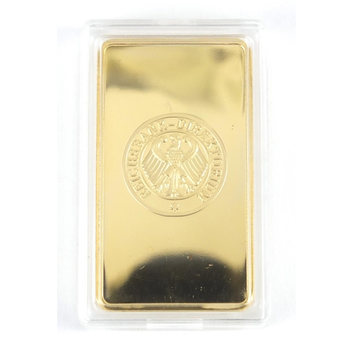 638 - Gold coloured ingot