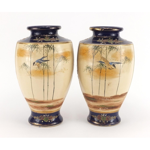 575 - Pair of Japanese Satsuma pottery vases, hand painted with warriors, character marks to the bases, ea... 