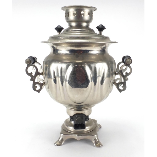 162 - Silvered metal samovar with twin ebonised handles, 34cm high