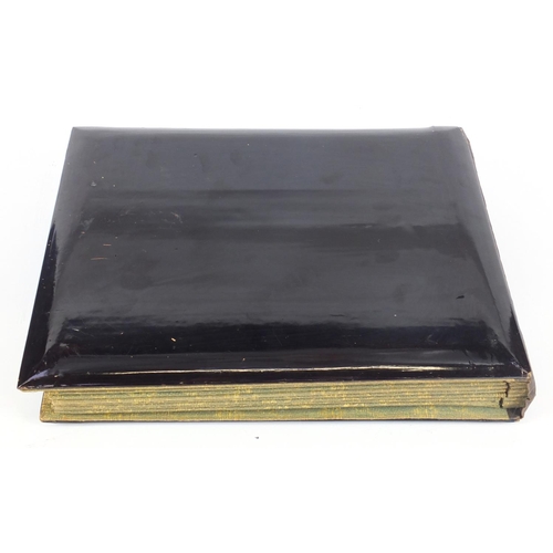 826 - Oriental black lacquer postcard album, with Mother of Pearl decoration, housing postcards including ... 