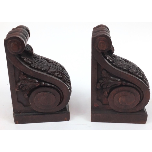 44 - Pair of carved wood corbles, 30cm high