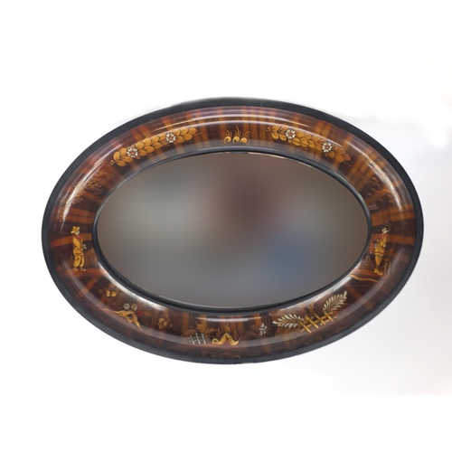 2015 - Oval bevelled edge mirror, hand decorated with figures and flowers, 91cm wide x 64cm