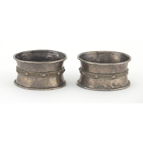 368 - Pair of circular silver Celtic design napkin rings, B.S Ltd Birmingham 1967, 5cm in diameter, approx... 