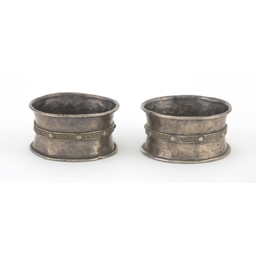 368 - Pair of circular silver Celtic design napkin rings, B.S Ltd Birmingham 1967, 5cm in diameter, approx... 