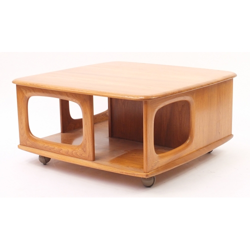 2012 - Ercol light elm coffee table fitted with two drawers, 40cm H x 80cm W x 80cm D