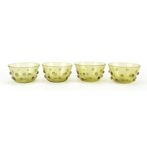 170 - Four Arts & Crafts green glass finger bowls, each 13.5cm in diameter