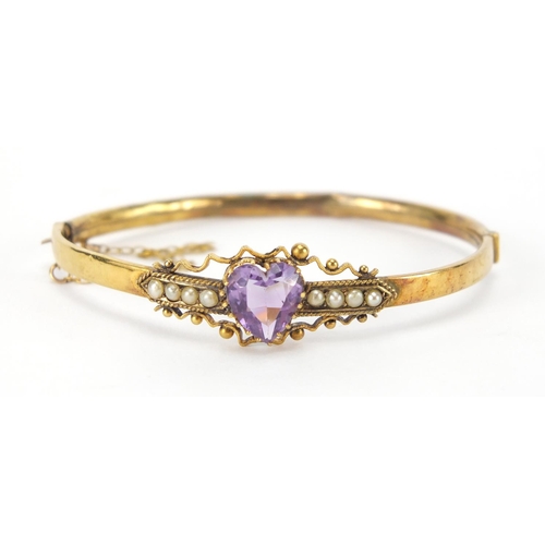 280 - Victorian gilt metal love heart amethyst and seed pearl bangle, 6cm x 5.5cm, approximate weight 5.4g