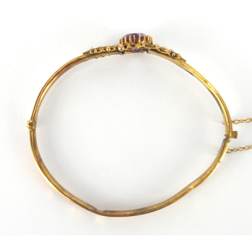 280 - Victorian gilt metal love heart amethyst and seed pearl bangle, 6cm x 5.5cm, approximate weight 5.4g