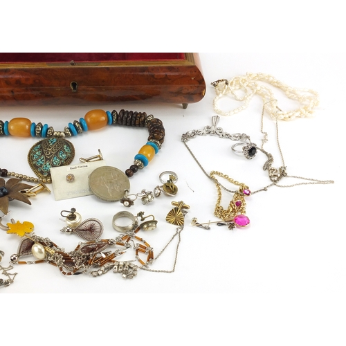 330 - Costume jewellery including silver earrings, necklaces and brooches, housed in a Sorrento style musi... 