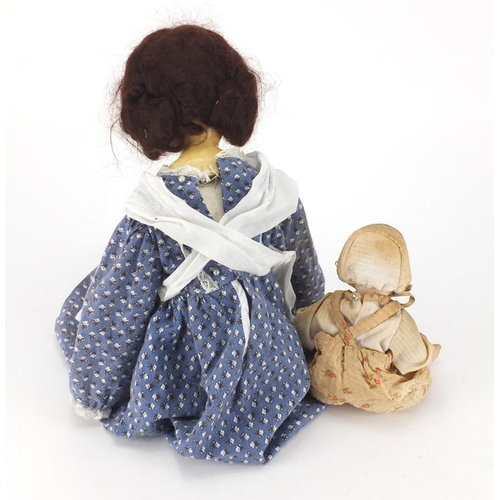 759 - Queen Anne style porcelain doll and a bisque baby, the largest 42cm high