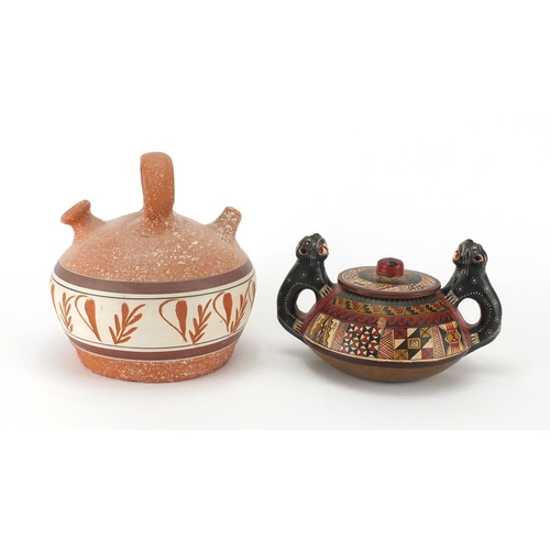 793 - Peruvian twin handled pot and cover, hand painted with geometric shapes together with one other, the... 