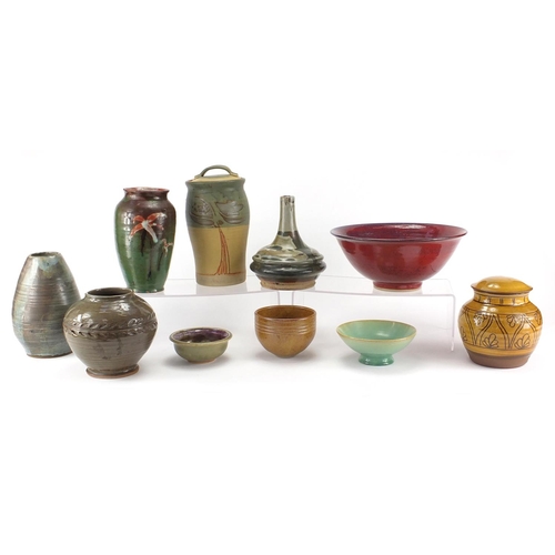 802 - Studio pottery including a Dartington bowl and vases, various marks, the largest 24cm high