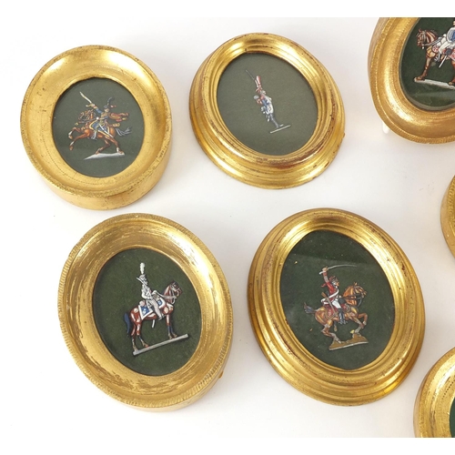 883 - Oval gilt framed miniatures of Infantry on horseback, standing soldiers etc