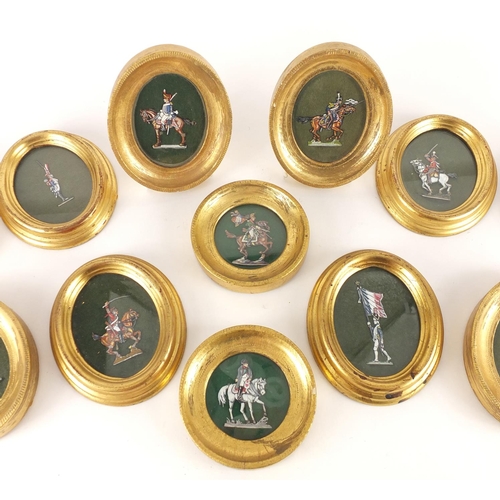 883 - Oval gilt framed miniatures of Infantry on horseback, standing soldiers etc