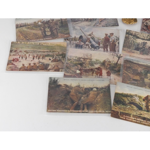 898 - Military interest items including postcards, a trench art lighter and Royal Engineers cap badge