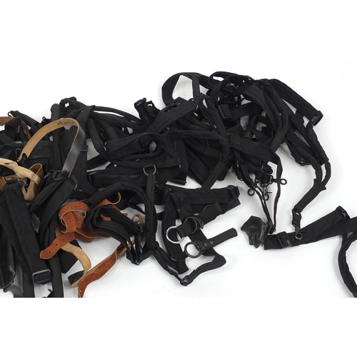 918 - Collection of mixed Military holsters and slings