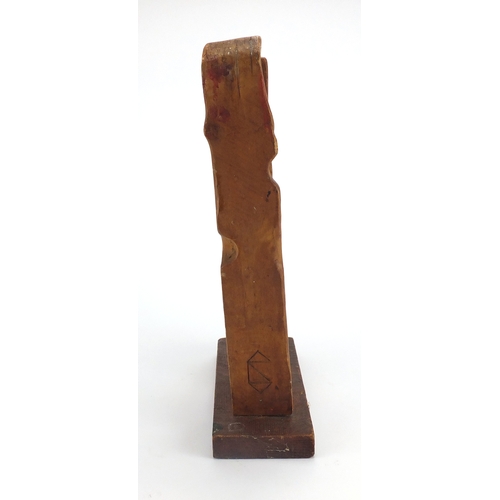 150 - Modernist carved wood sculpture on a rectangular plinth base, bearing incised marks, overall 41cm hi... 