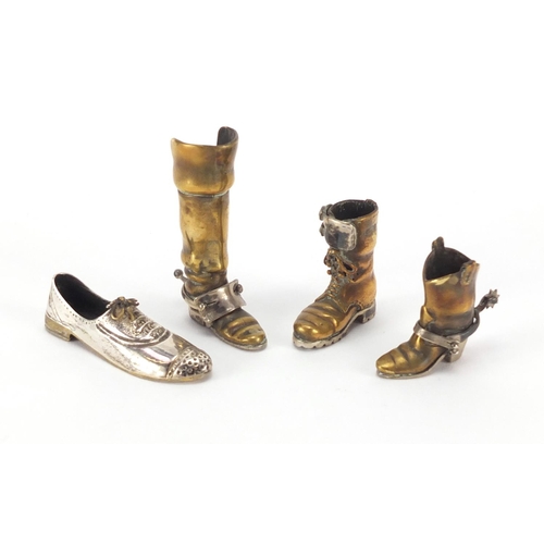 381 - Four 925 silver and brass shoes including cowboy boots, the largest 5.5cm high, approximate weight 8... 