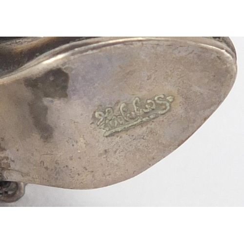 381 - Four 925 silver and brass shoes including cowboy boots, the largest 5.5cm high, approximate weight 8... 