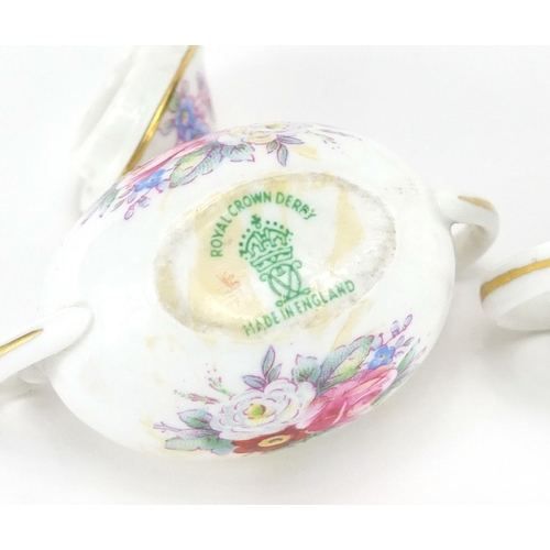 393 - Miniature Royal Crown Derby three piece tea set, the teapot 7.5cm in length