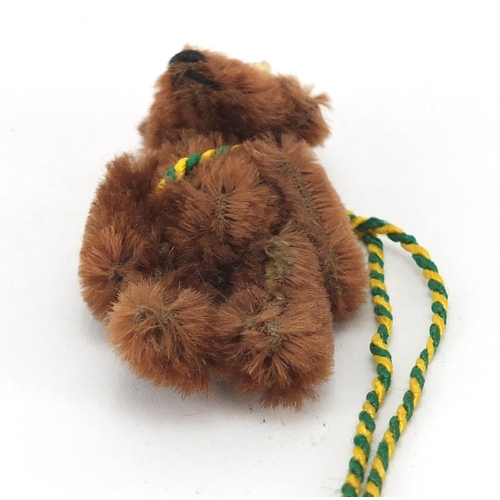 401 - Miniature Schuco BP limited edition teddy bear, 7cm high