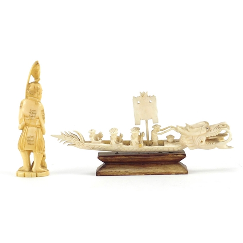 408 - Japanese carved ivory Okimono of fishermen, together with a carving of figures in a dragon boat on h... 