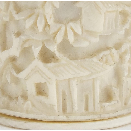 409 - Chinese Canton ivory puzzle ball and cylindrical pot, each carved with figures, the largest 4.5cm in... 