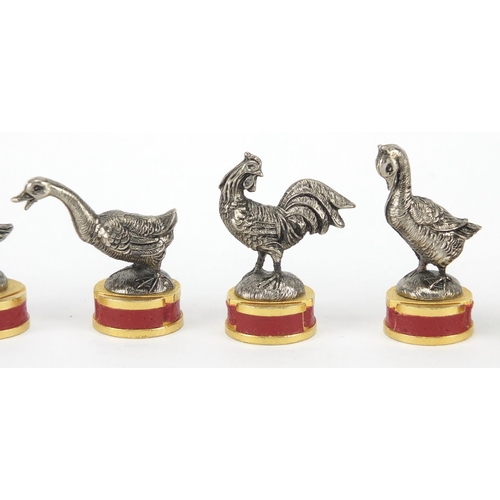 418 - Group of novelty Toffano silver plated place card holders including chickens, the largest 4.5cm high