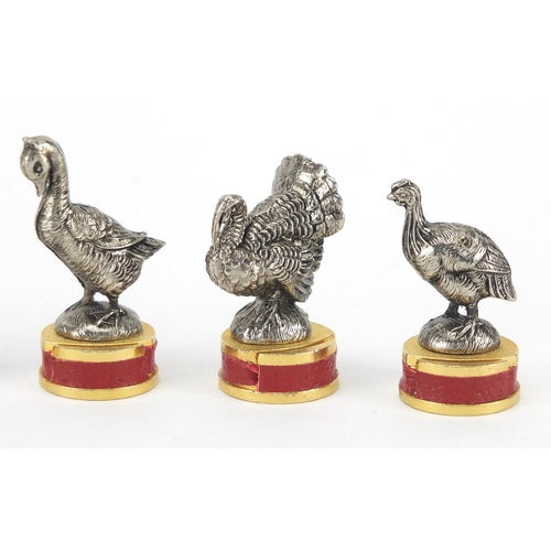 418 - Group of novelty Toffano silver plated place card holders including chickens, the largest 4.5cm high