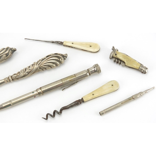 420 - Objects including silver handled button hook and shoe horn, bone flanked sewing items, pocket knives... 