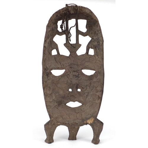 487 - Large African tribal carved wooden face mask, 58cm high