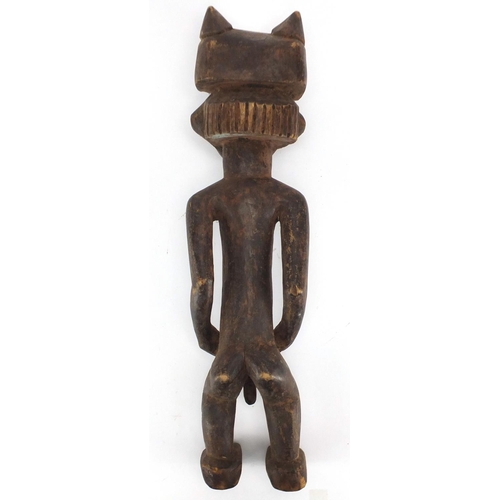 488 - African tribal carved wooden fertility doll, 54cm high