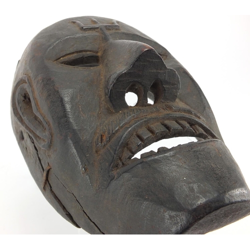 490 - African Tribal carved wooden face mask, 20cm high