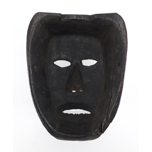 490 - African Tribal carved wooden face mask, 20cm high