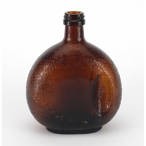 503 - By Appointment to HM The King brown glass bottle, 20.5cm high