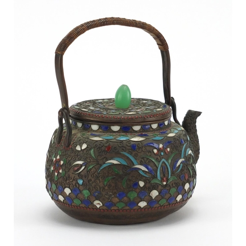 504 - Oriental coffee pot with swing handle, enamelled with flowers, 13cm in length