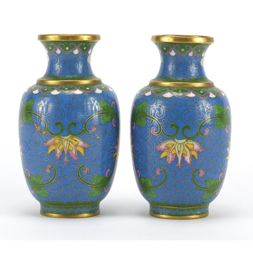 529 - Pair of Chinese cloisonné vases, both enamelled with flower heads and foliate scrolls, each 11cm hig... 