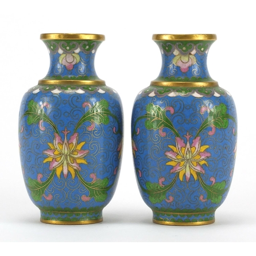 529 - Pair of Chinese cloisonné vases, both enamelled with flower heads and foliate scrolls, each 11cm hig... 